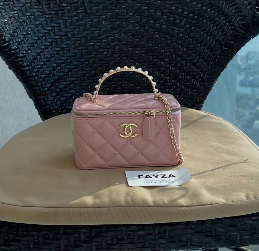 Chanel Vanity Case — pink lambskin with pearl top handle