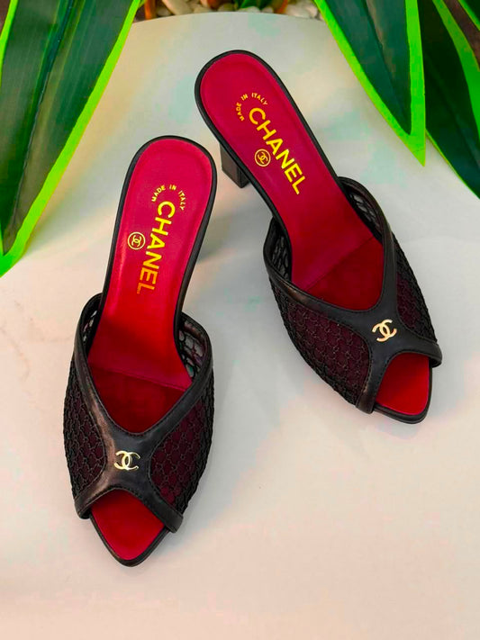 Chanel Mules Featuring a Striking White Mesh Upper