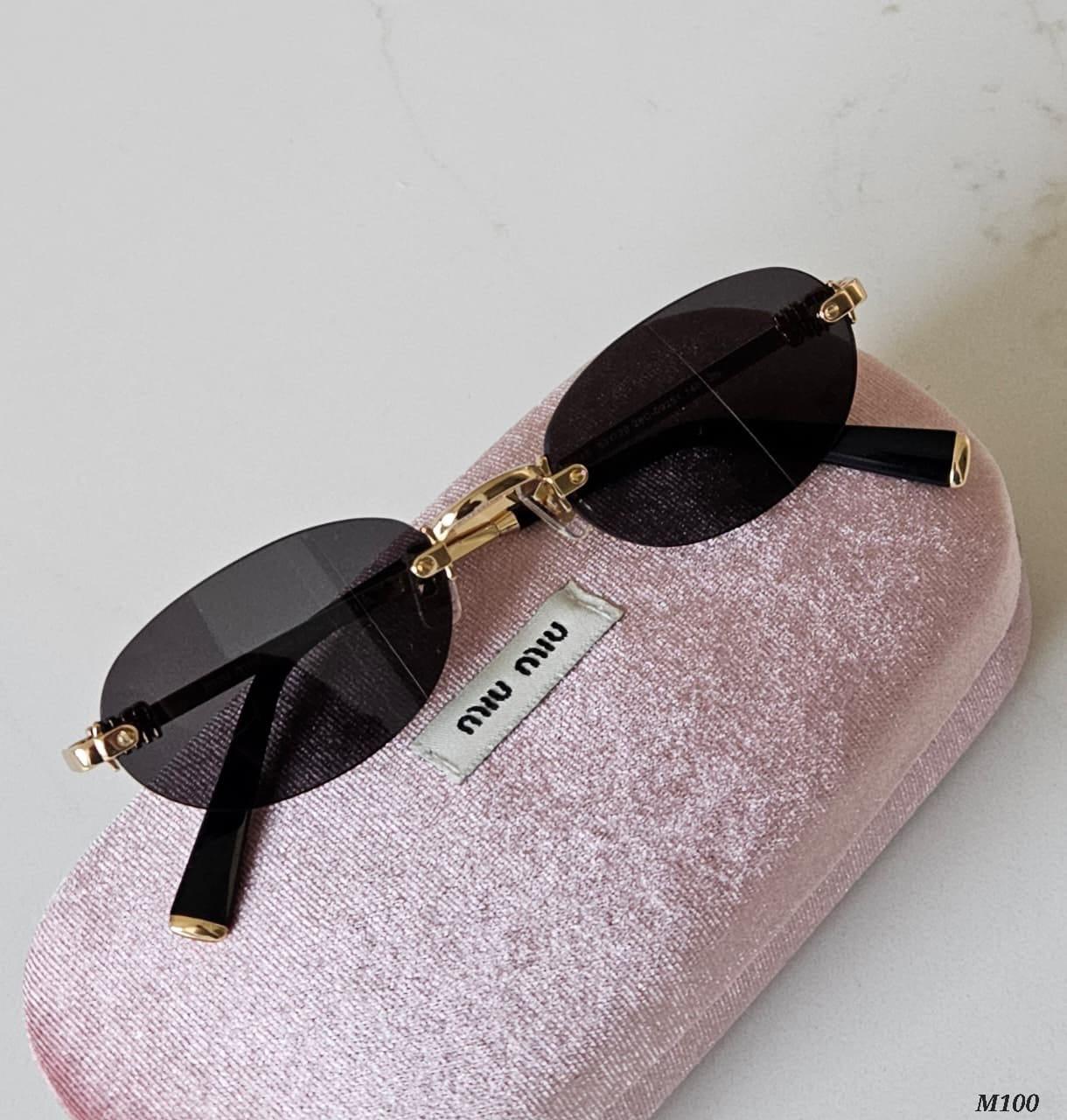 Miu Miu Rimless Oval Sunglasses (M100)