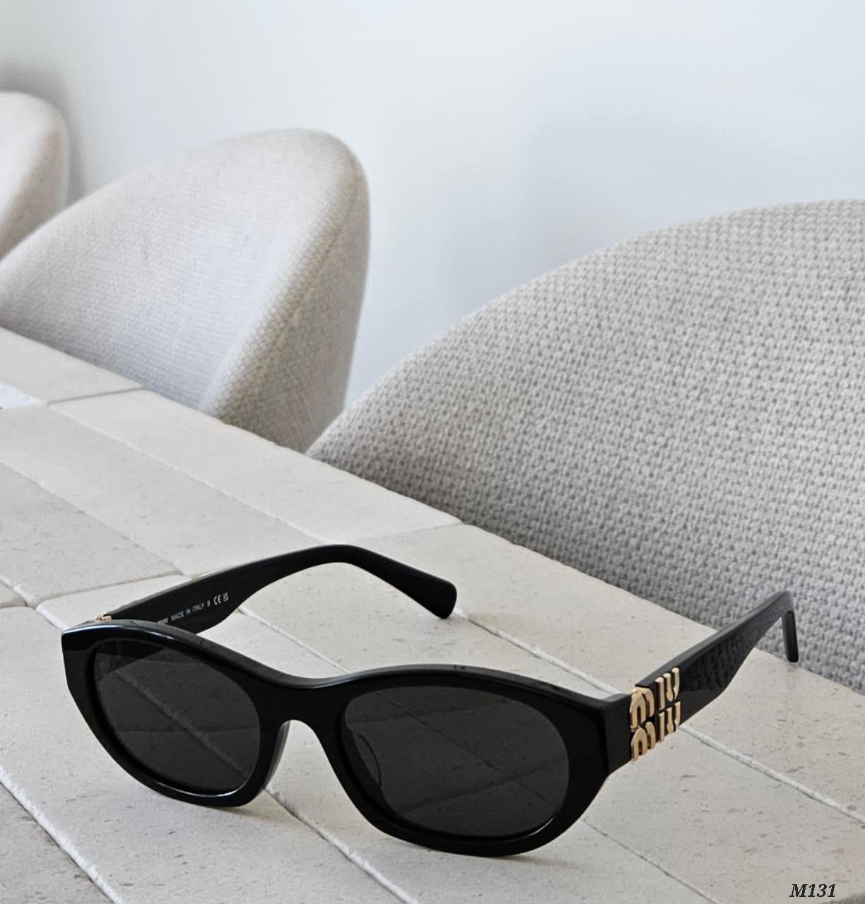 Miu Miu Oval Sunglasses (M131)