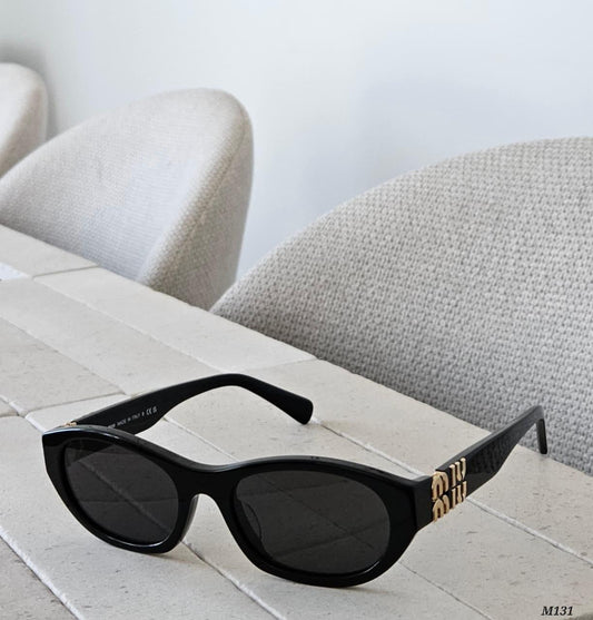 Miu Miu Oval Sunglasses (M131)