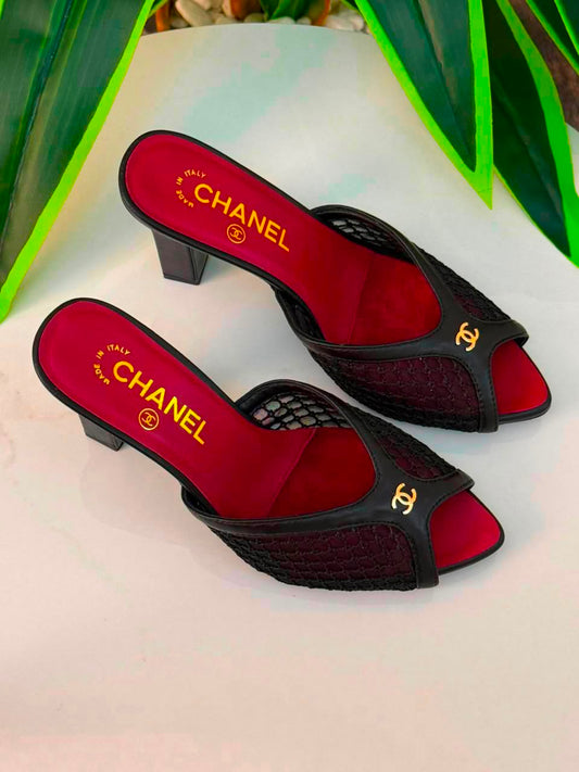 Chanel Mules Featuring a Striking White Mesh Upper