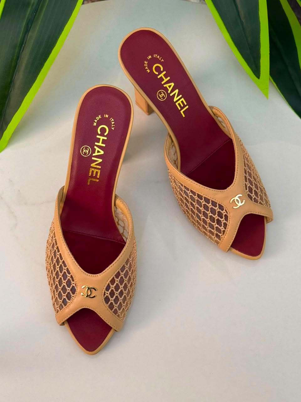 Chanel Mules Featuring a Striking White Mesh Upper